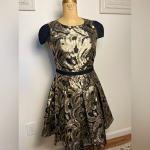 Anthropologie women’s cap sleeve black & gold special occasion dress size 4